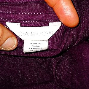 Maroon sweatshirt, tieson bottom right side.